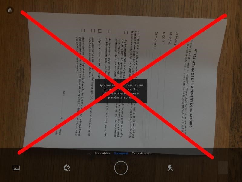Exemple de mauvaise position de la feuille à scanner de l'application Adobe Scan